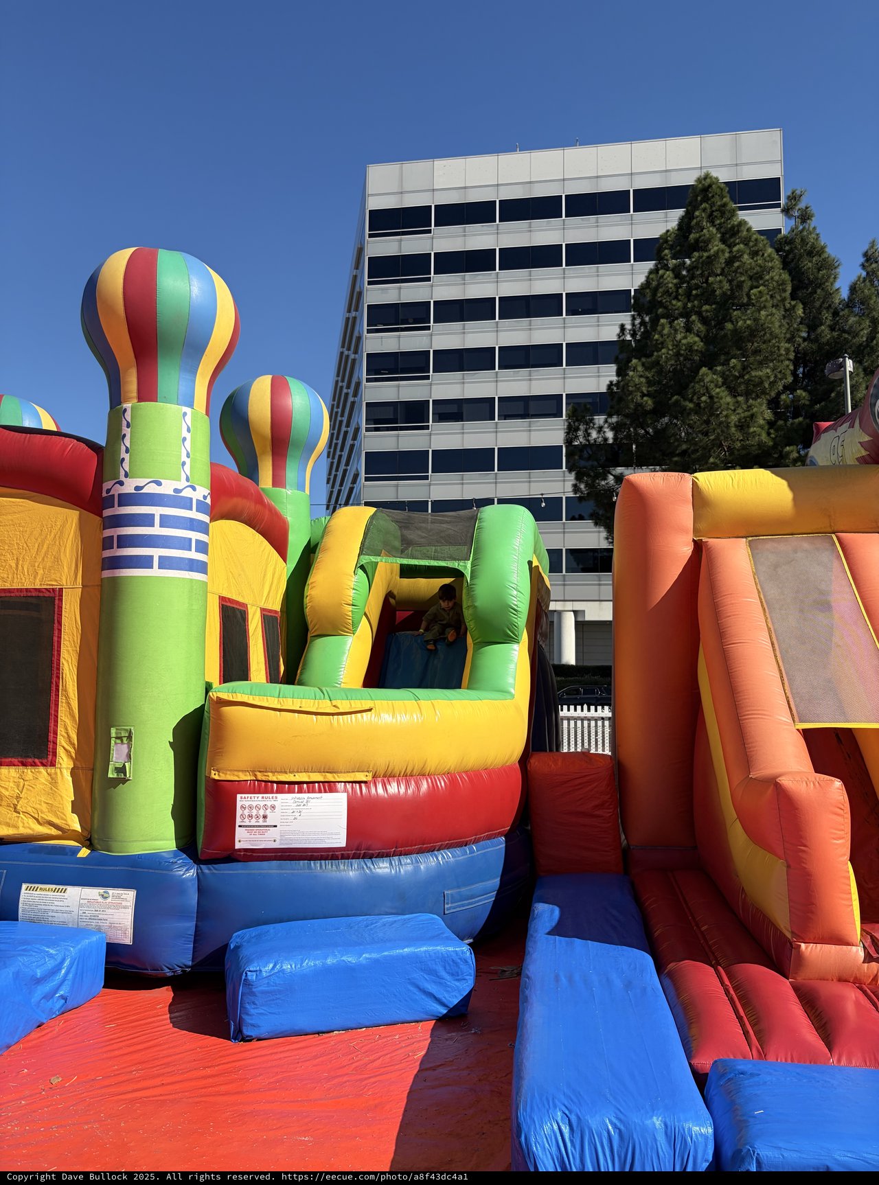 Colorful Inflatable Bounce House at Urban Outdoor Event