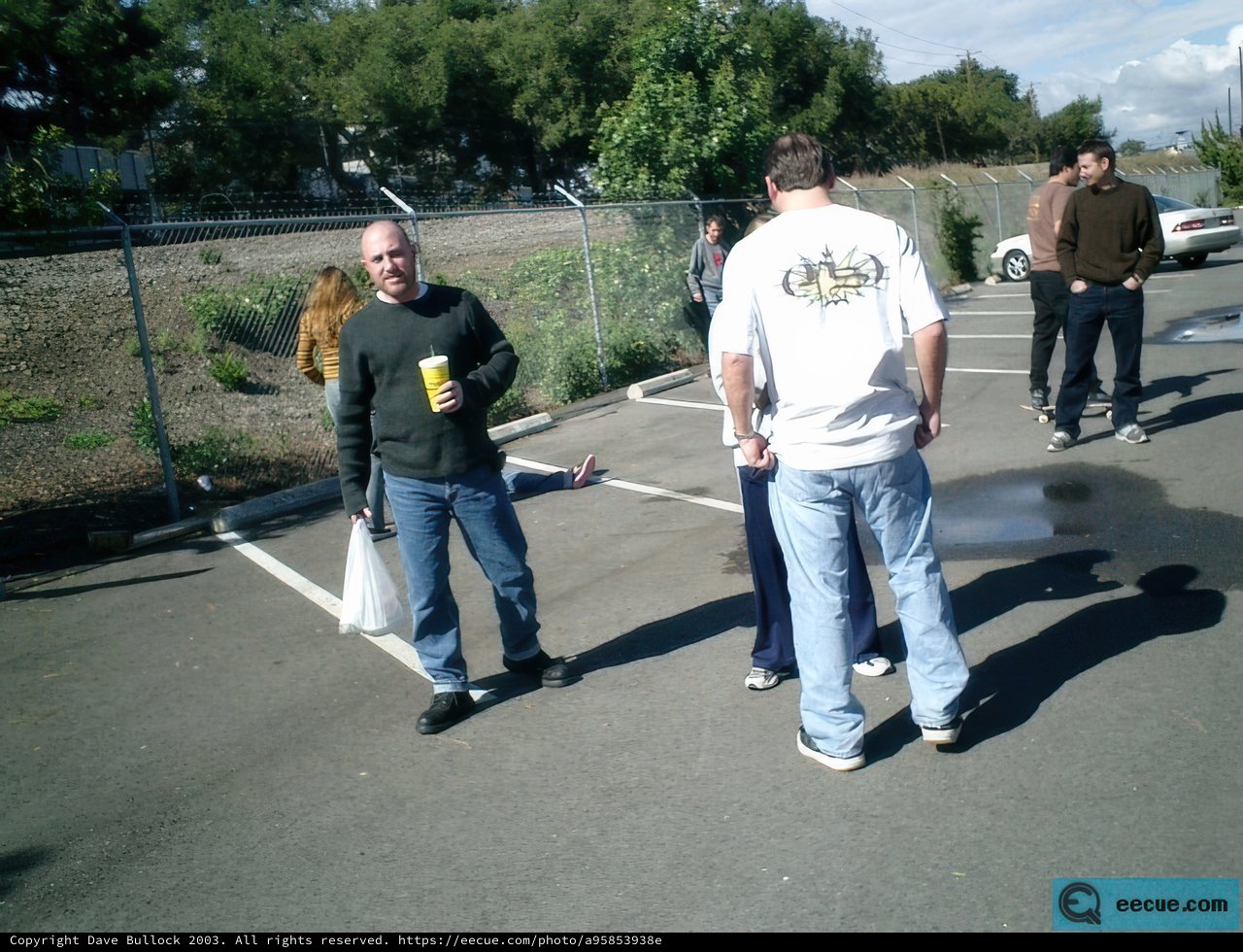 Group of People in Urban Parking Lot