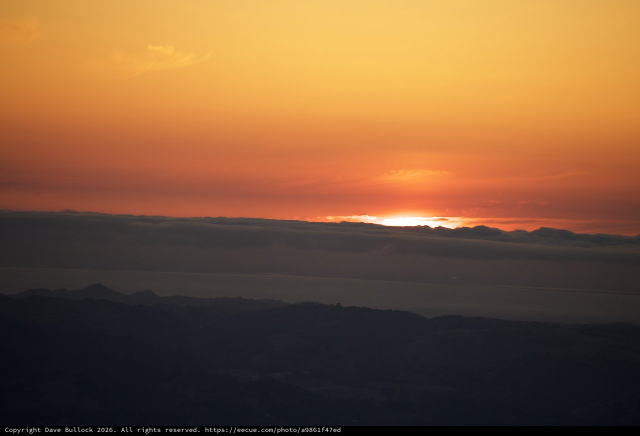 Golden Sunset Blazes Beyond the Bay Horizon