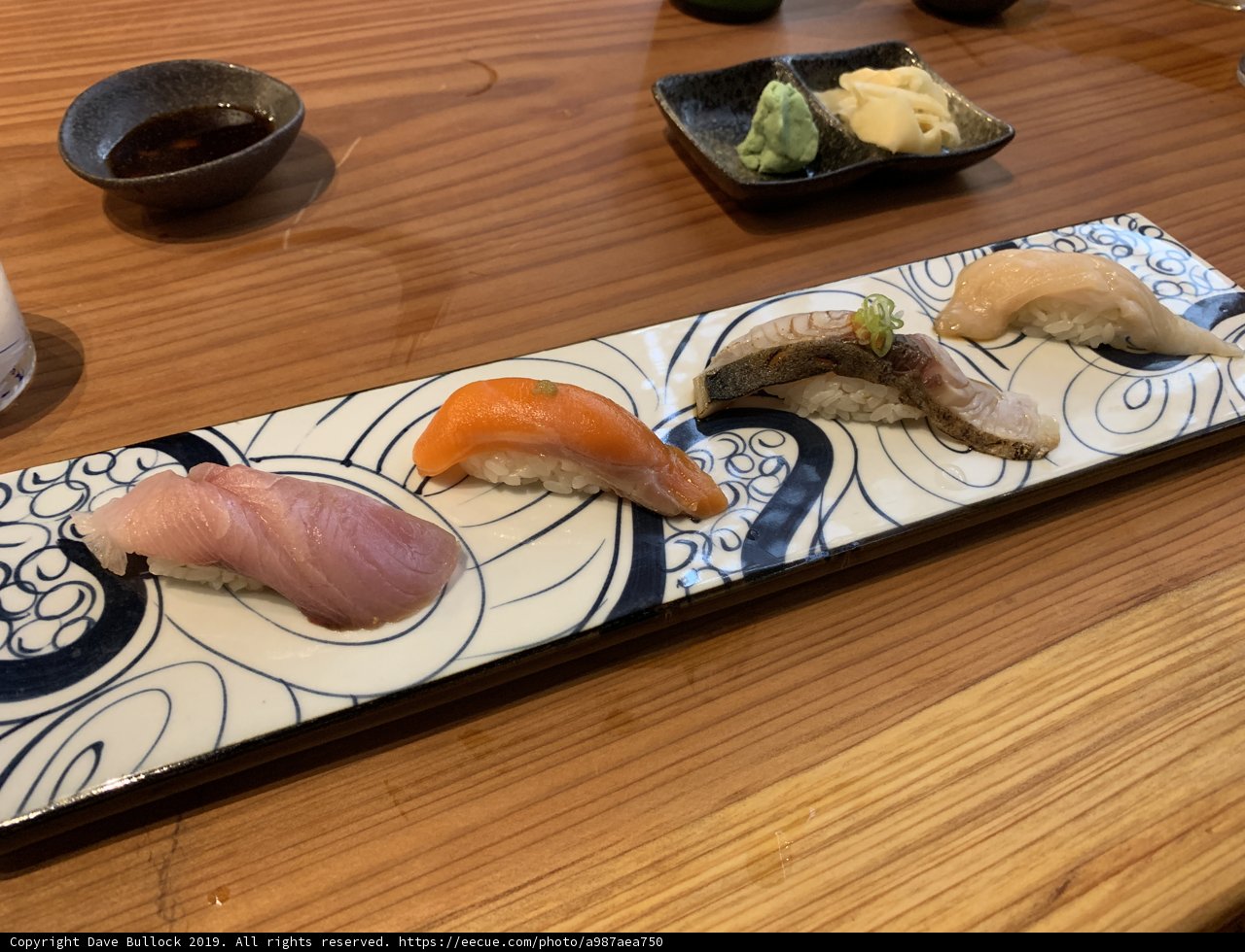 Sushi Sampler on a Wooden Plate