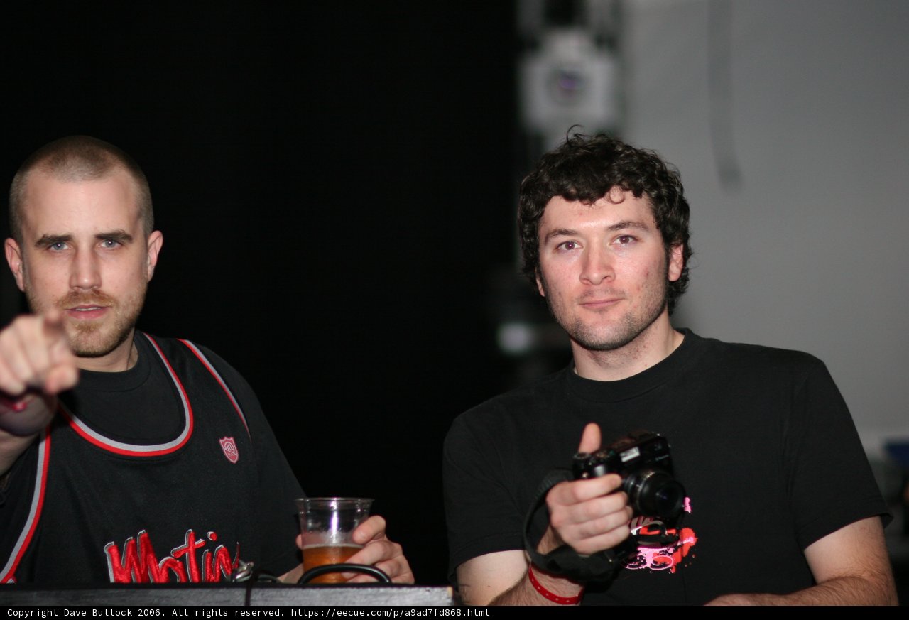 Two Men Enjoying Beers Together