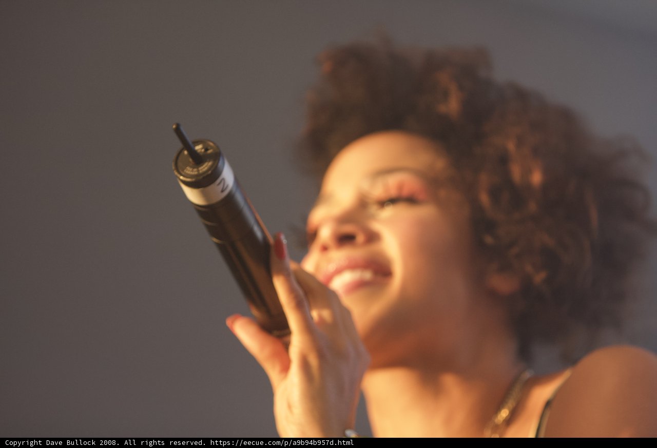 Curly-haired Woman Takes Center Stage