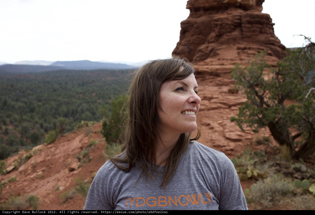 Smiling Woman Gazing Over Sedona Red Rock Landscape