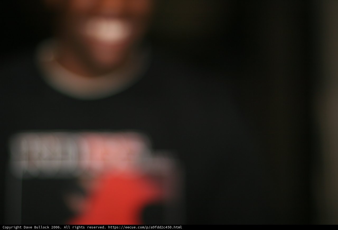 Smiling Man in a Blurry Tee