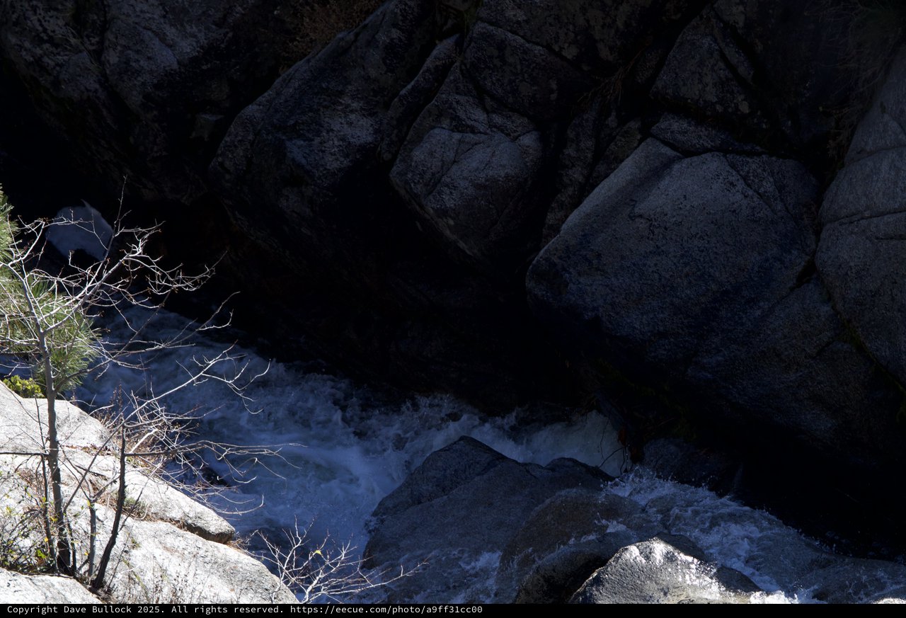 Winter Rapids Through Granite Canyon Shadows