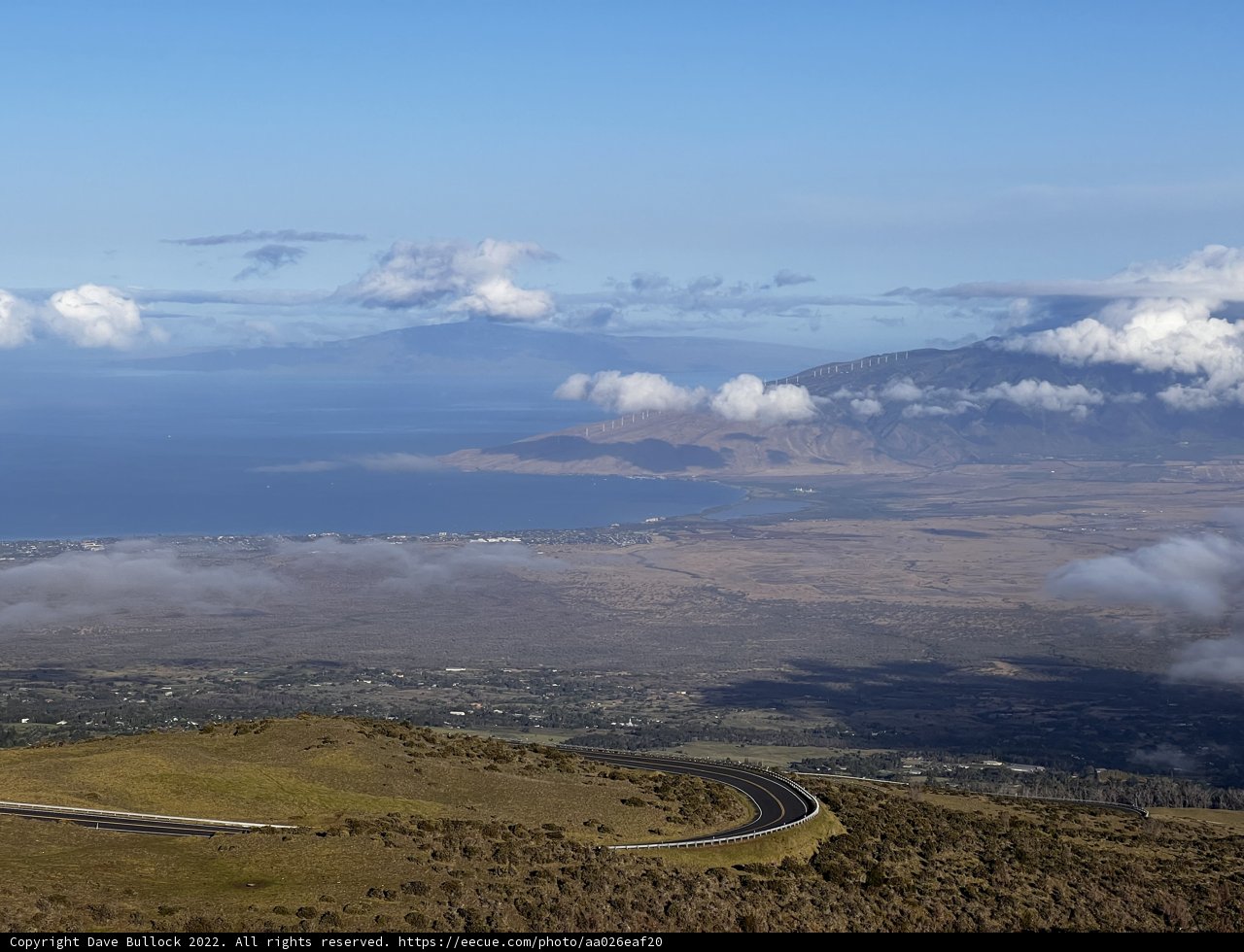 Aerial View of Maui's Scenic Road with Majestic Mountain Ranges