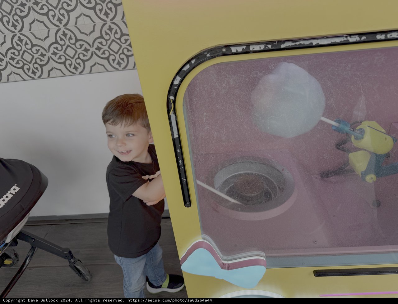 Young Boy Explores Interactive Science Museum Display