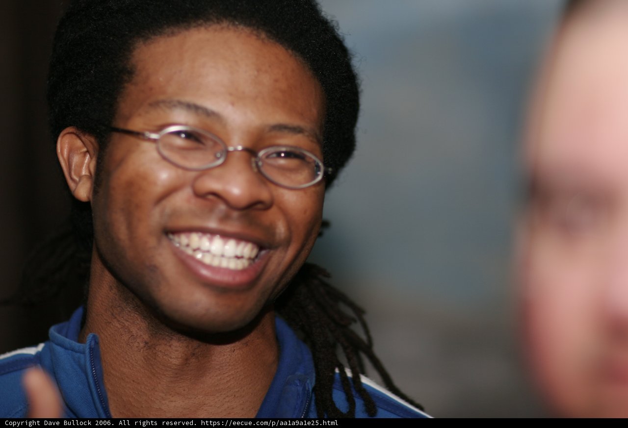 Happy Man with Dreadlocks and Glasses
