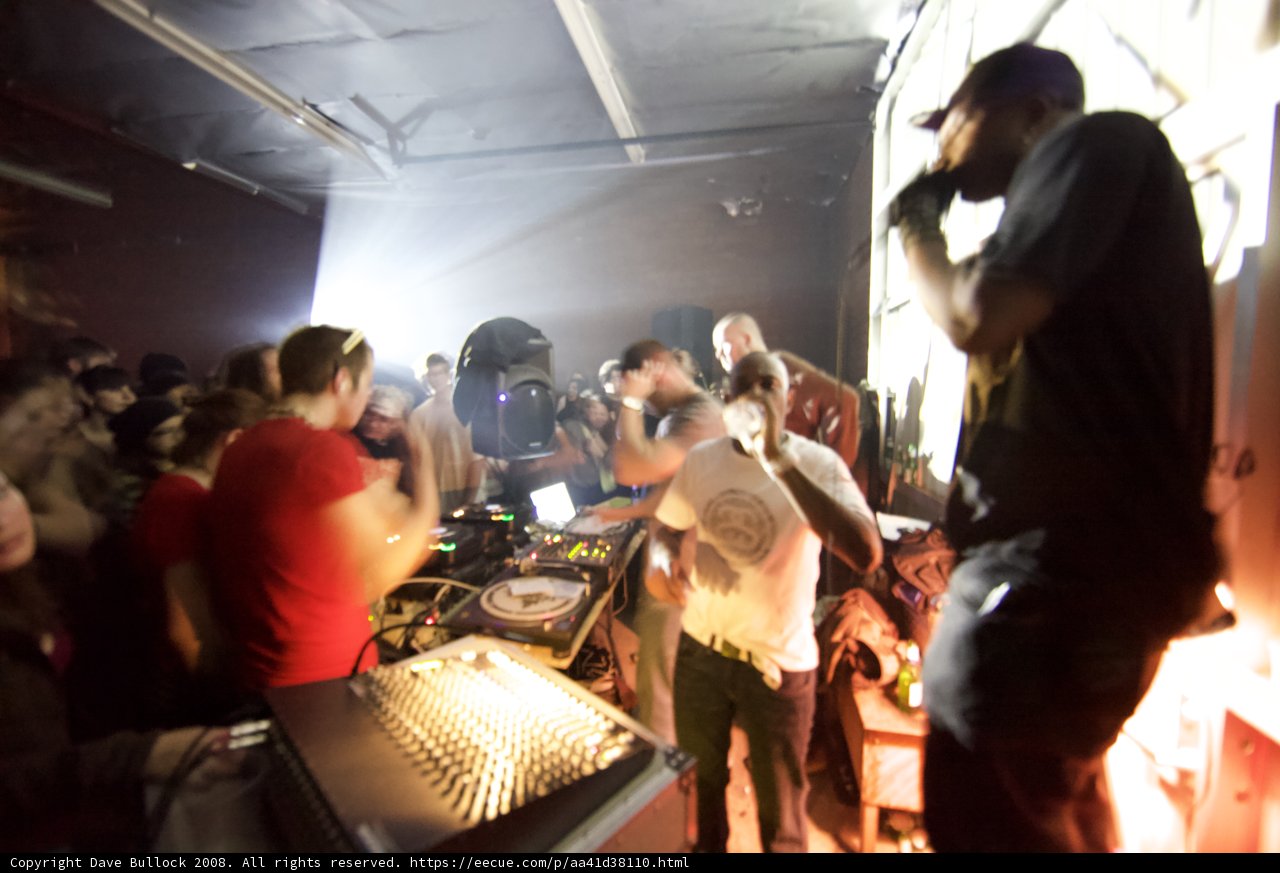 Nightclubers Being Entertained by the Dubstep Maestro