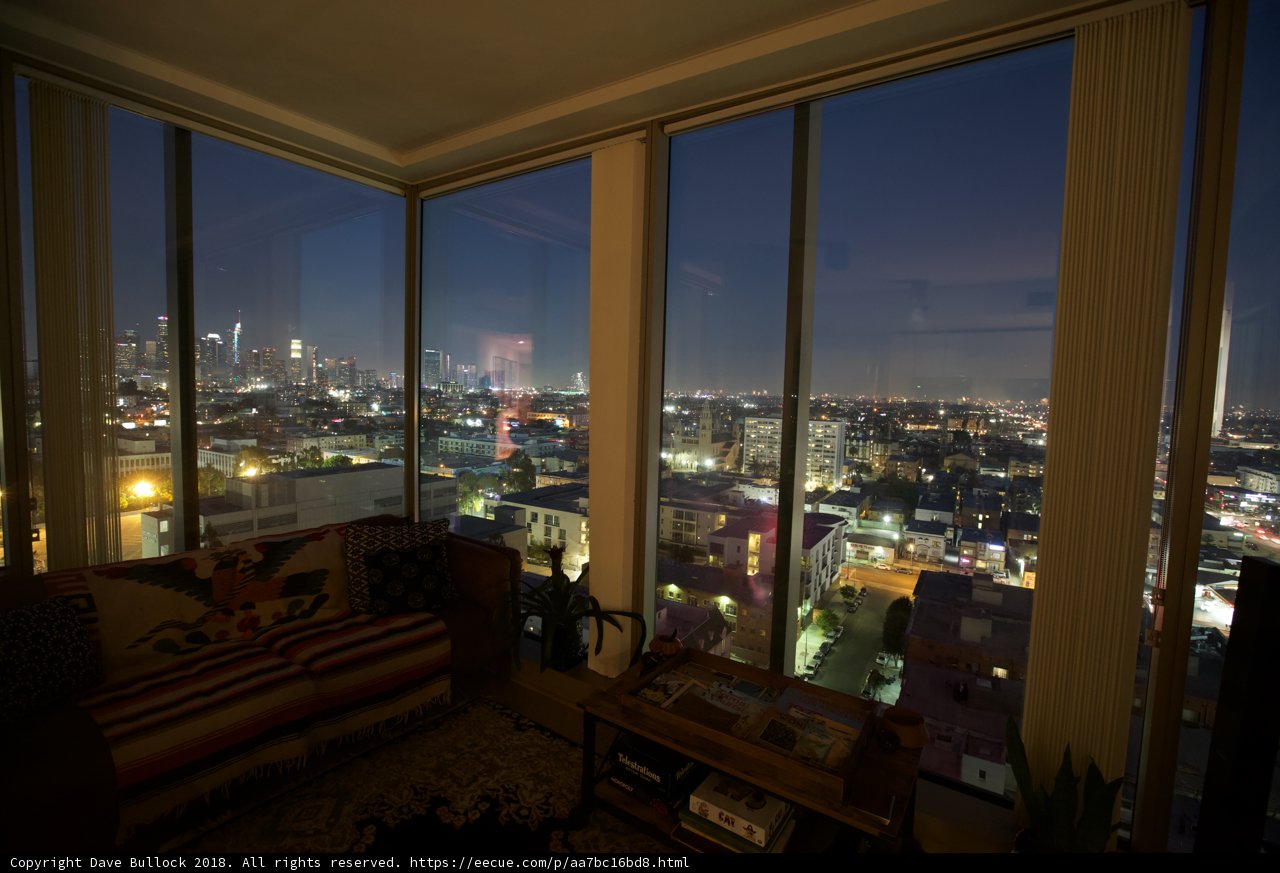 Cityscape View from a Penthouse Living Room Window