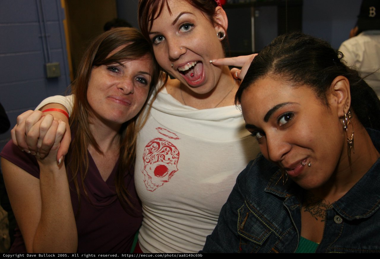 Three Friends Posing and Goofing at a Party