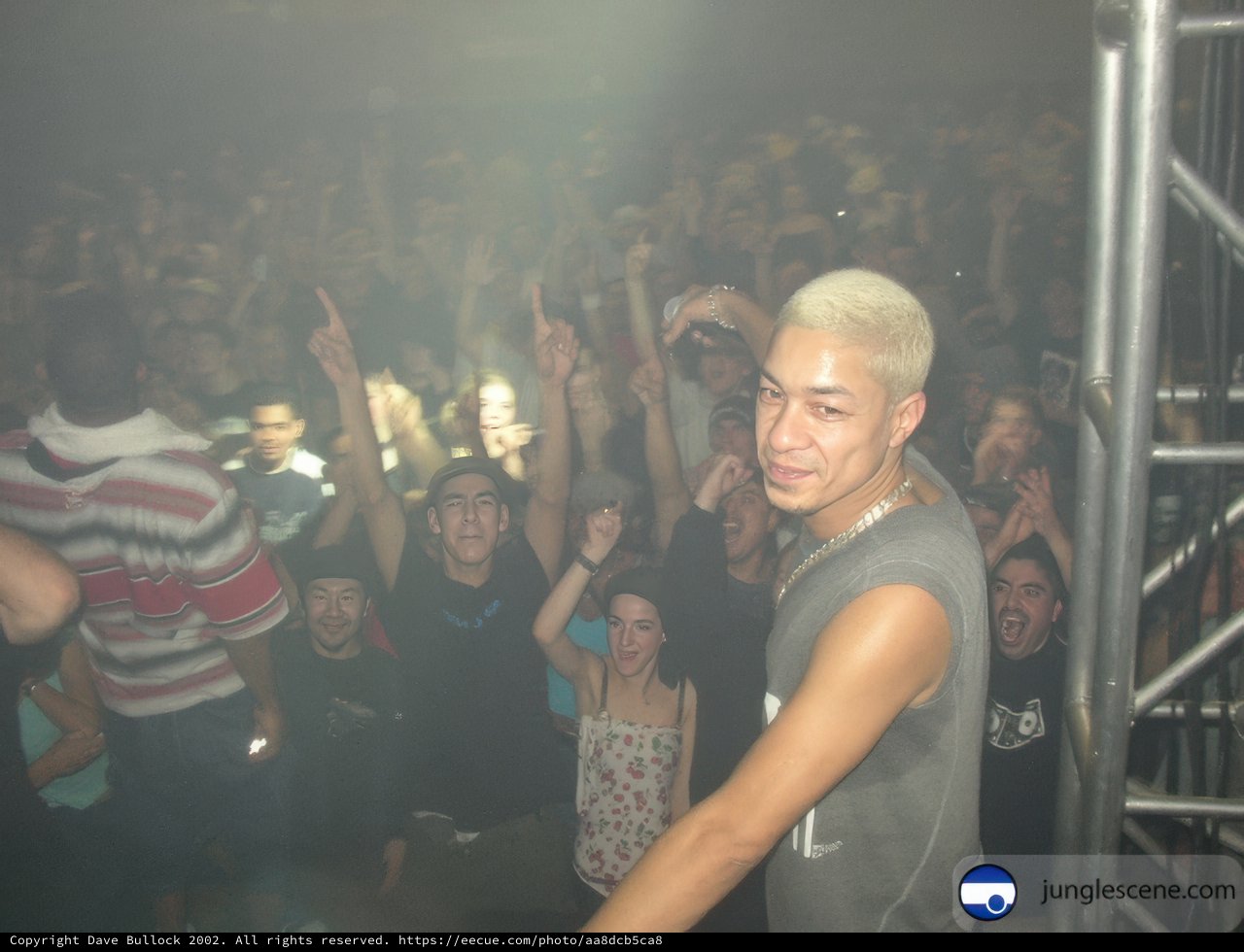 White-Haired Man in a Night Club Crowd