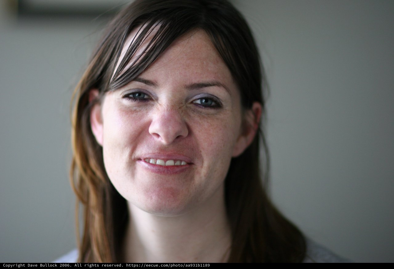 Warm Natural Portrait of Smiling Young Woman