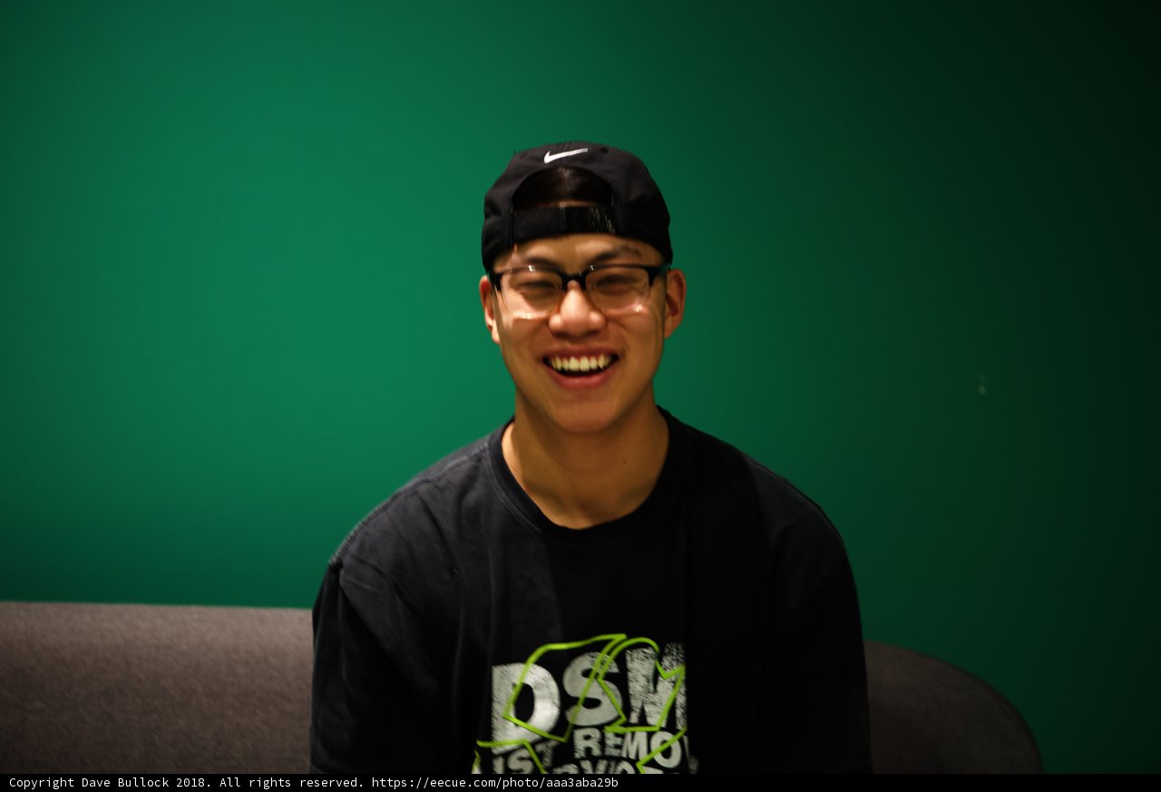 Smiling Man with Baseball Hat