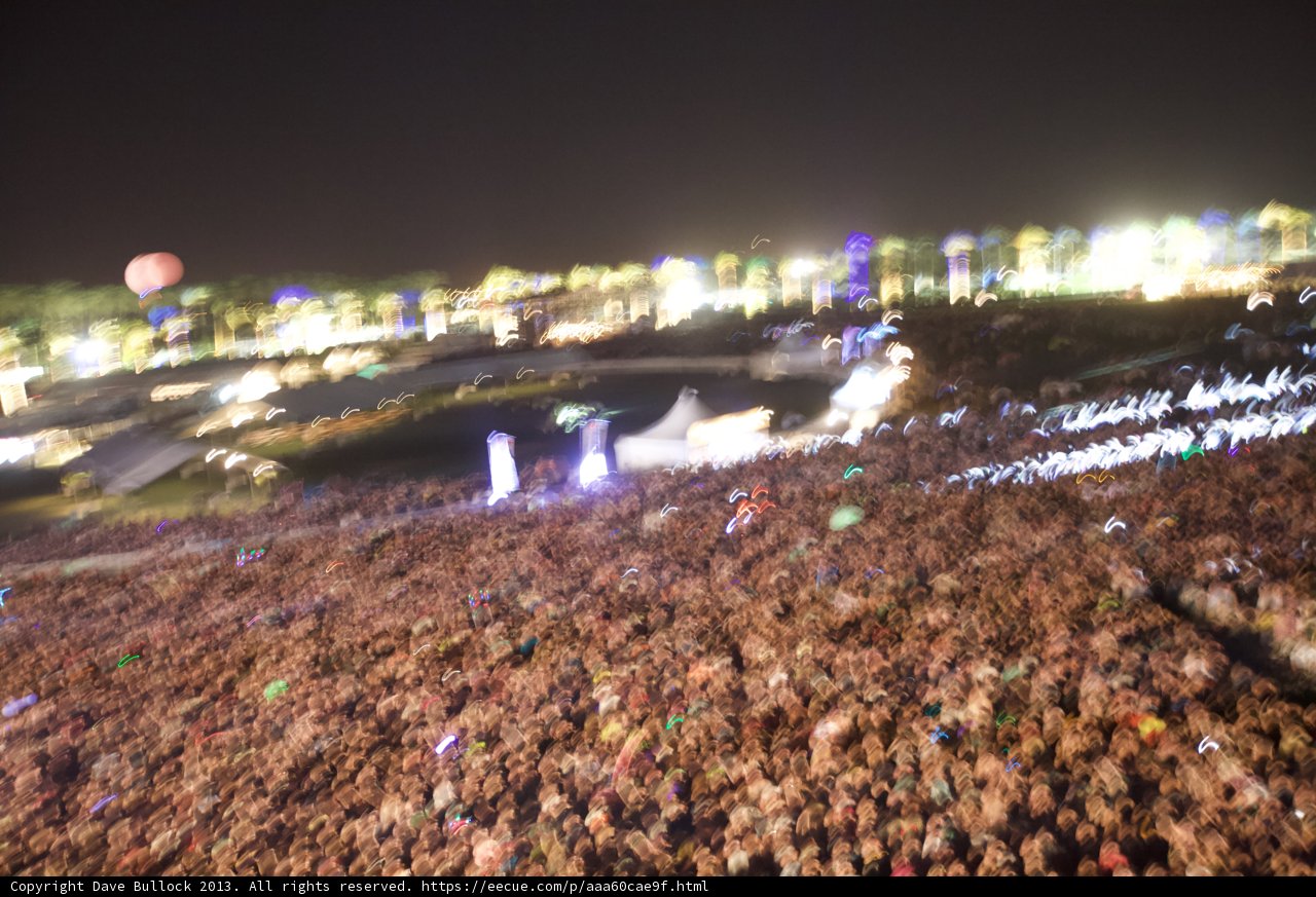 Coachella Crowd under Glowing Night Sky
