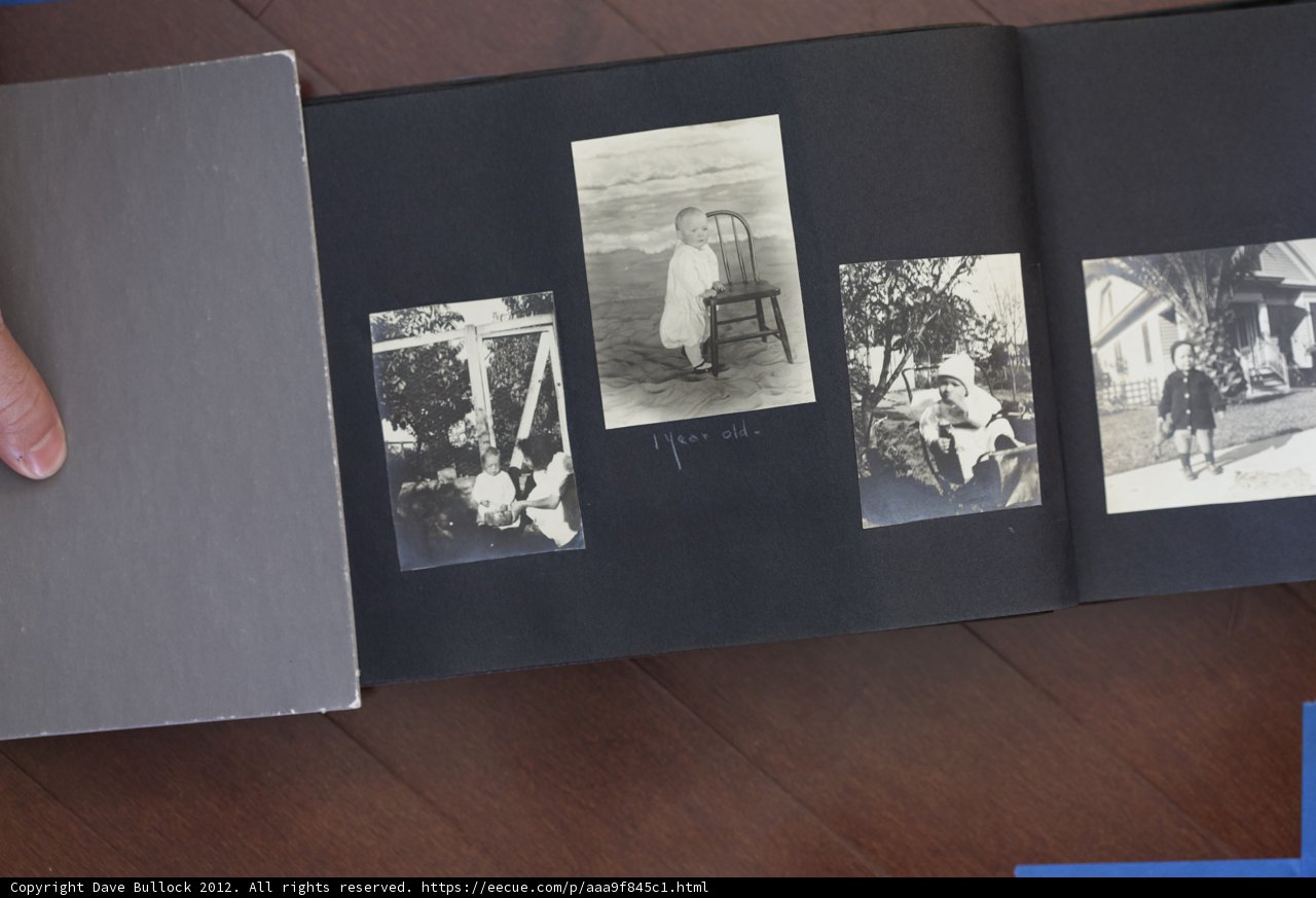 Bobby Hutchins Holds the 2012 Bullock Curtis Family Photo Album