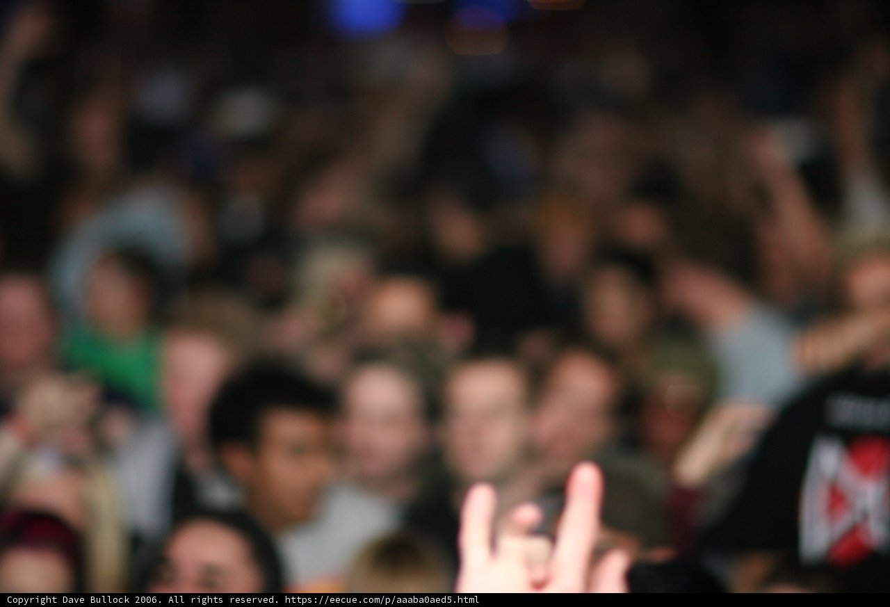 Blurred Fingers and Roaring Crowd