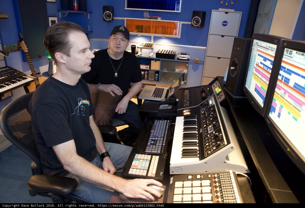 DJ Dan Jamming Out on His Keyboard and Guitar