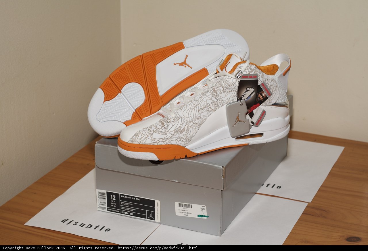 Orange and White Sneakers on a Box