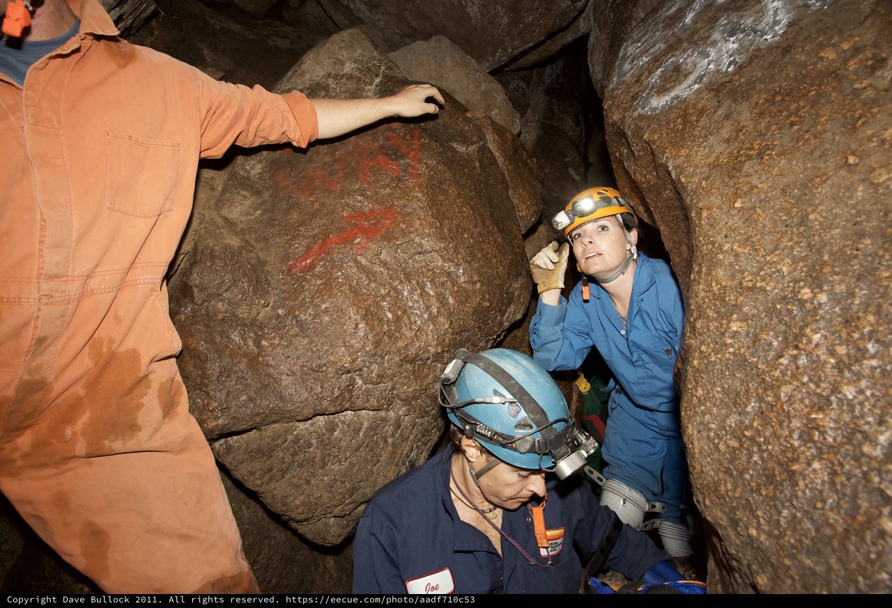 Cavers Examine Ancient Rock Art in Underground Cave
