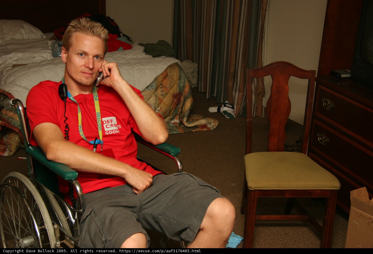 Wheelchair-bound man in his bedroom