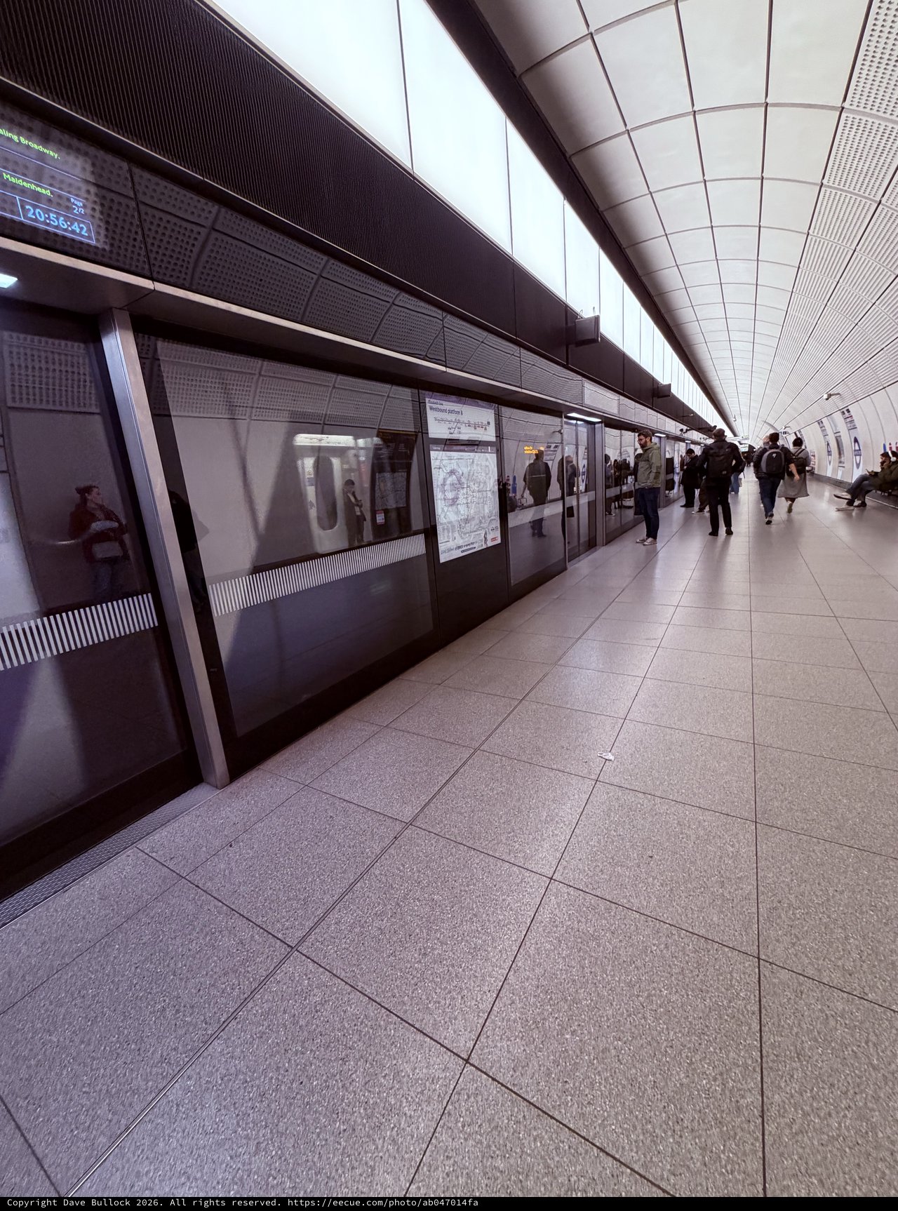 Modern London Underground Platform at Rush Hour