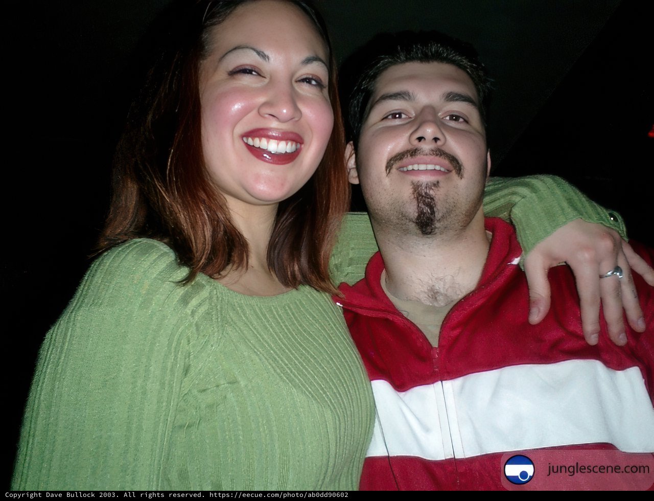Party photo: A couple posing for the perfect shot