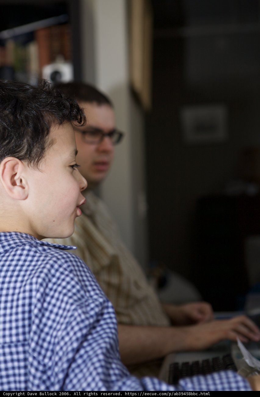 Blue Shirted Boy with Eyeglasses