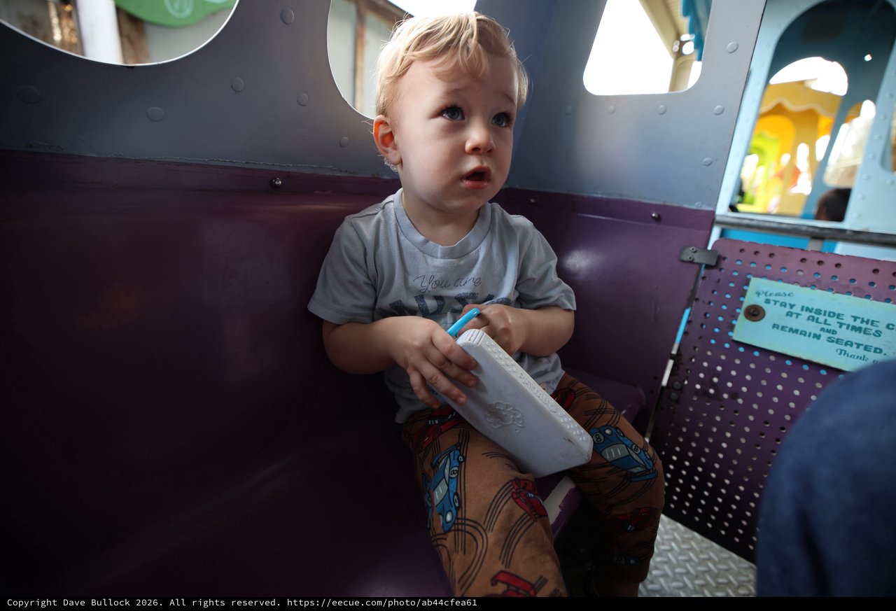 Toddler with Milk Box at Indoor Play Area