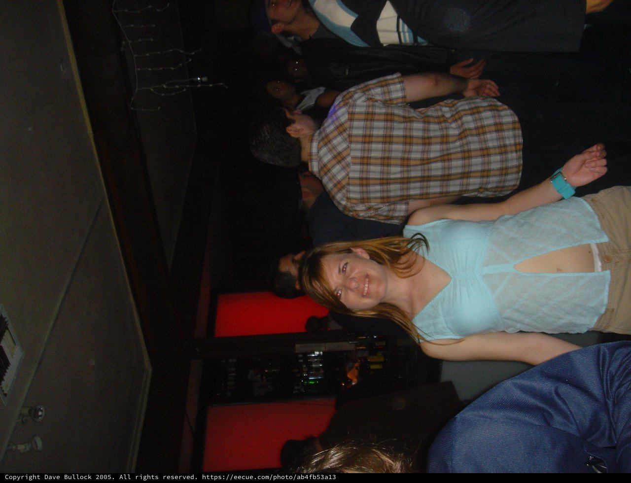 Young Woman Smiling at Nightclub Party 2005