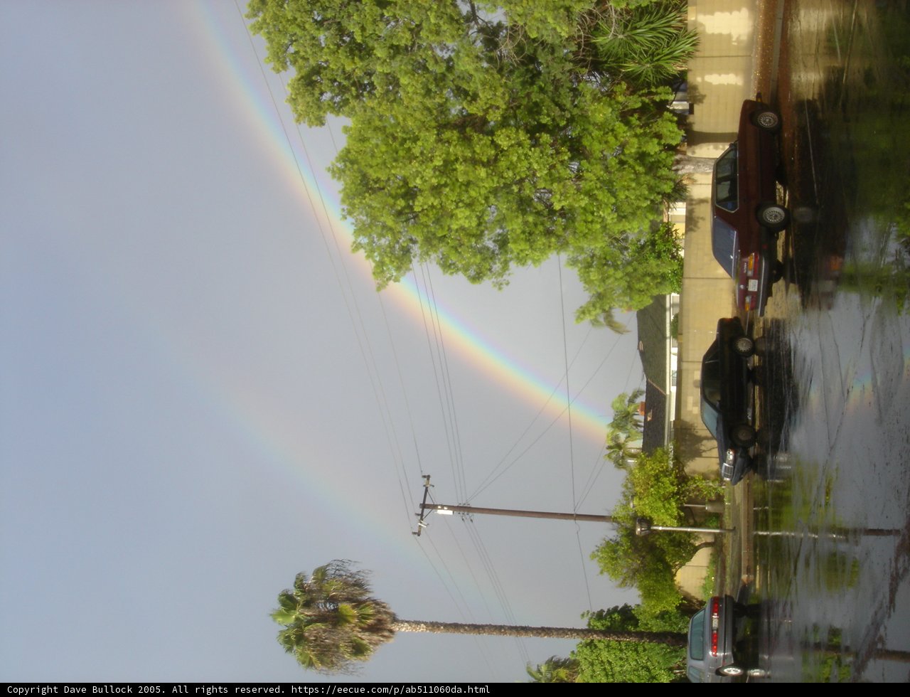 Double Rainbow Over Wet Pavement