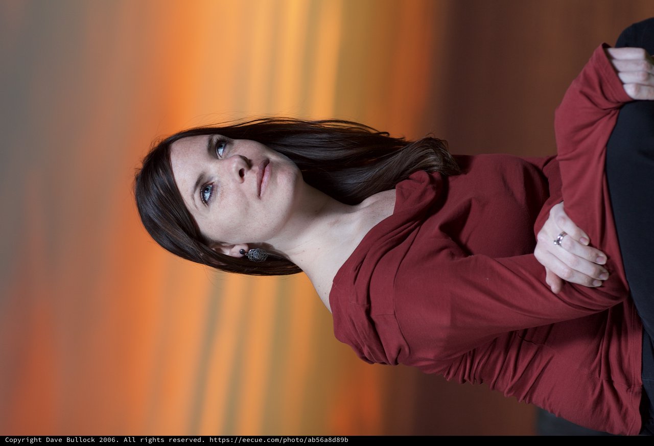 Pensive Woman at Dramatic Sunset Portrait