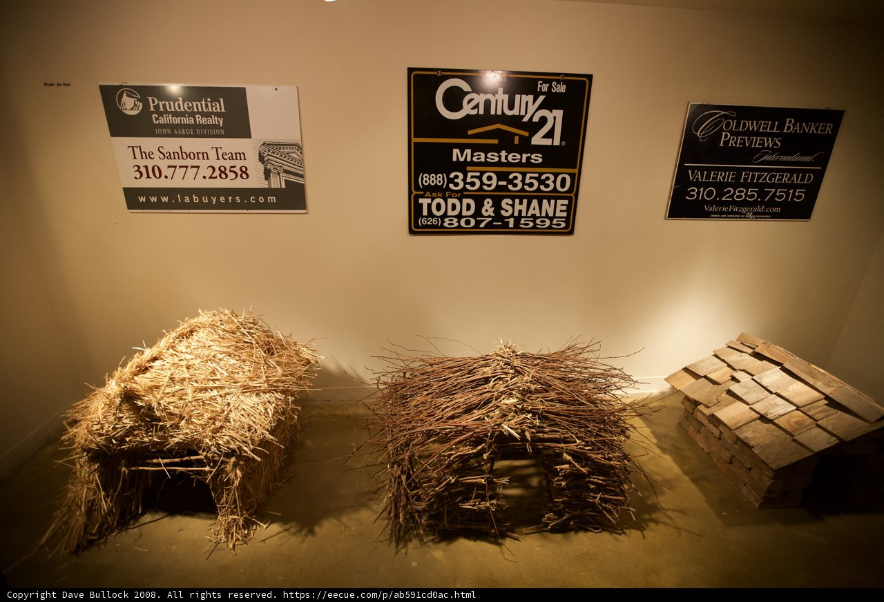 Three Straw Huts Advertise Nature-Friendly Businesses