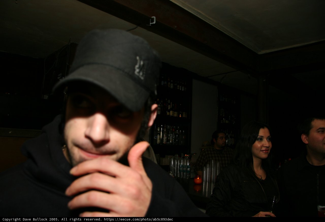 Black Hat Man at the Bar