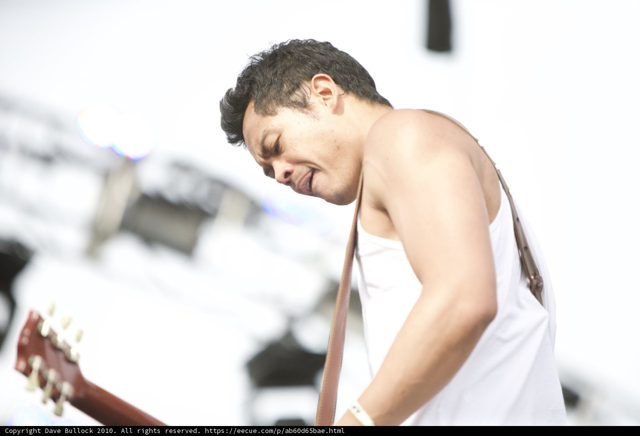 The White-Tank Top Guitarist Rocking Coachella