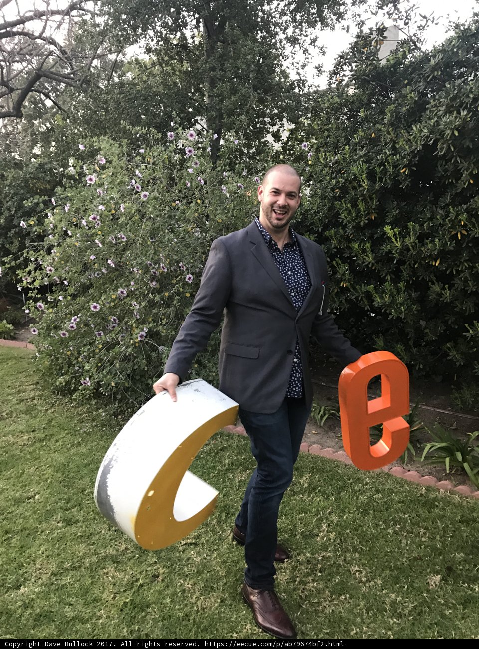 Holding the Letter in the Grass
