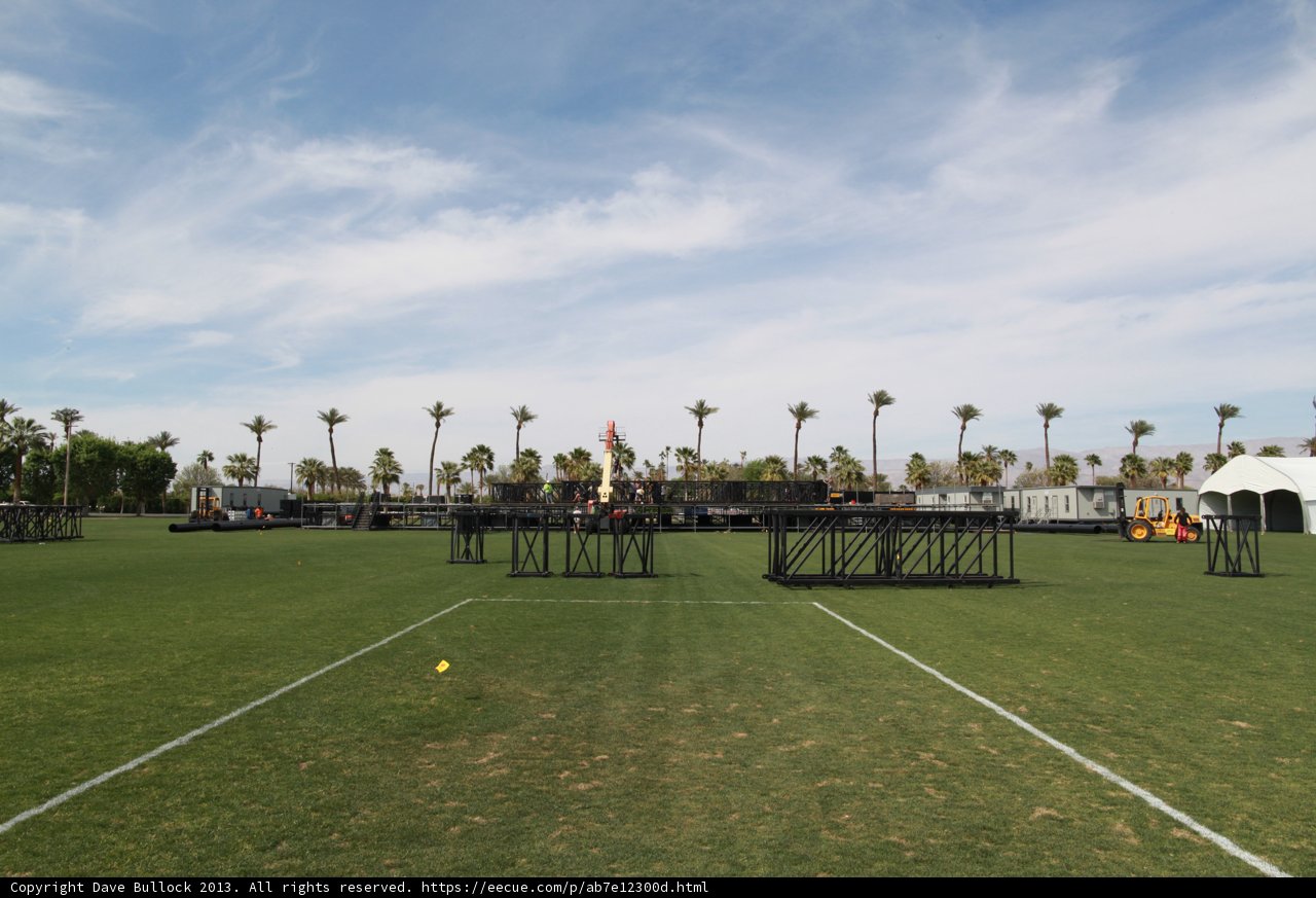 Tennis Match on a Grass Field