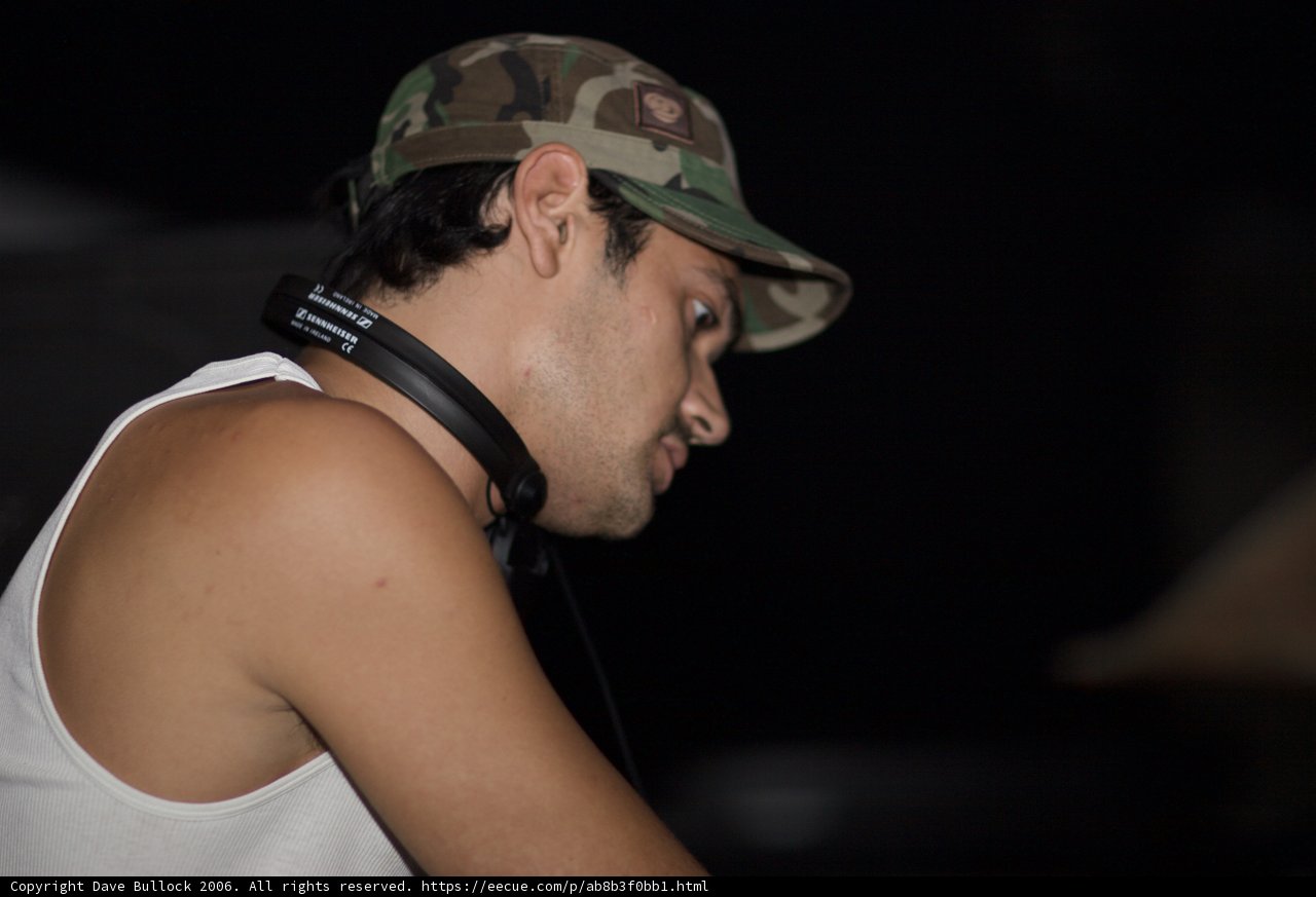 Party Man with Headgear and Earbuds