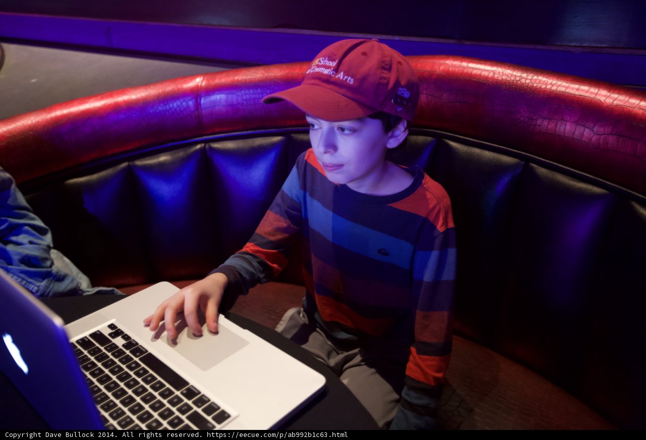 Red-Hatted Boy in Technology Mode
