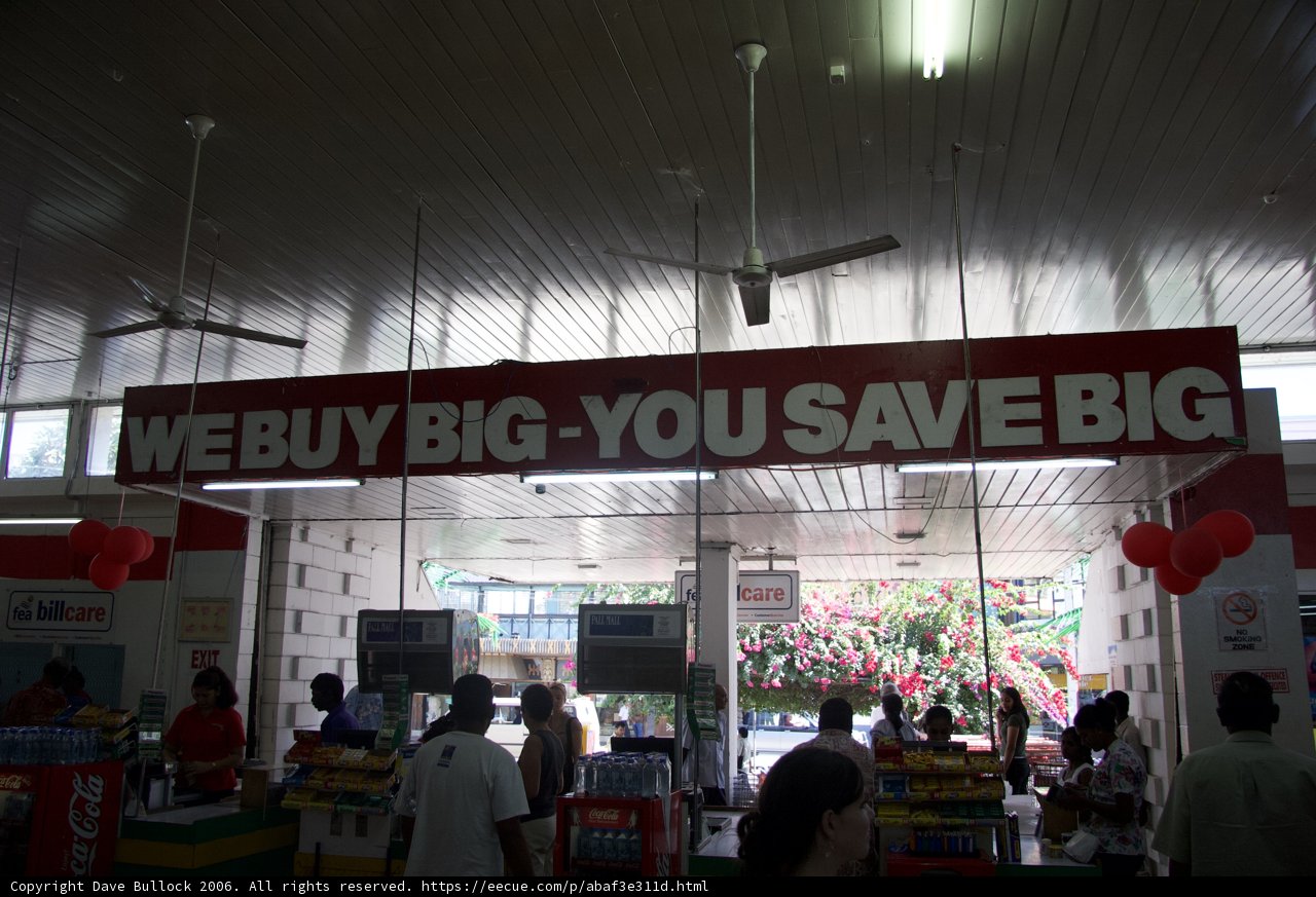 We Buy Big You Save Big Sign