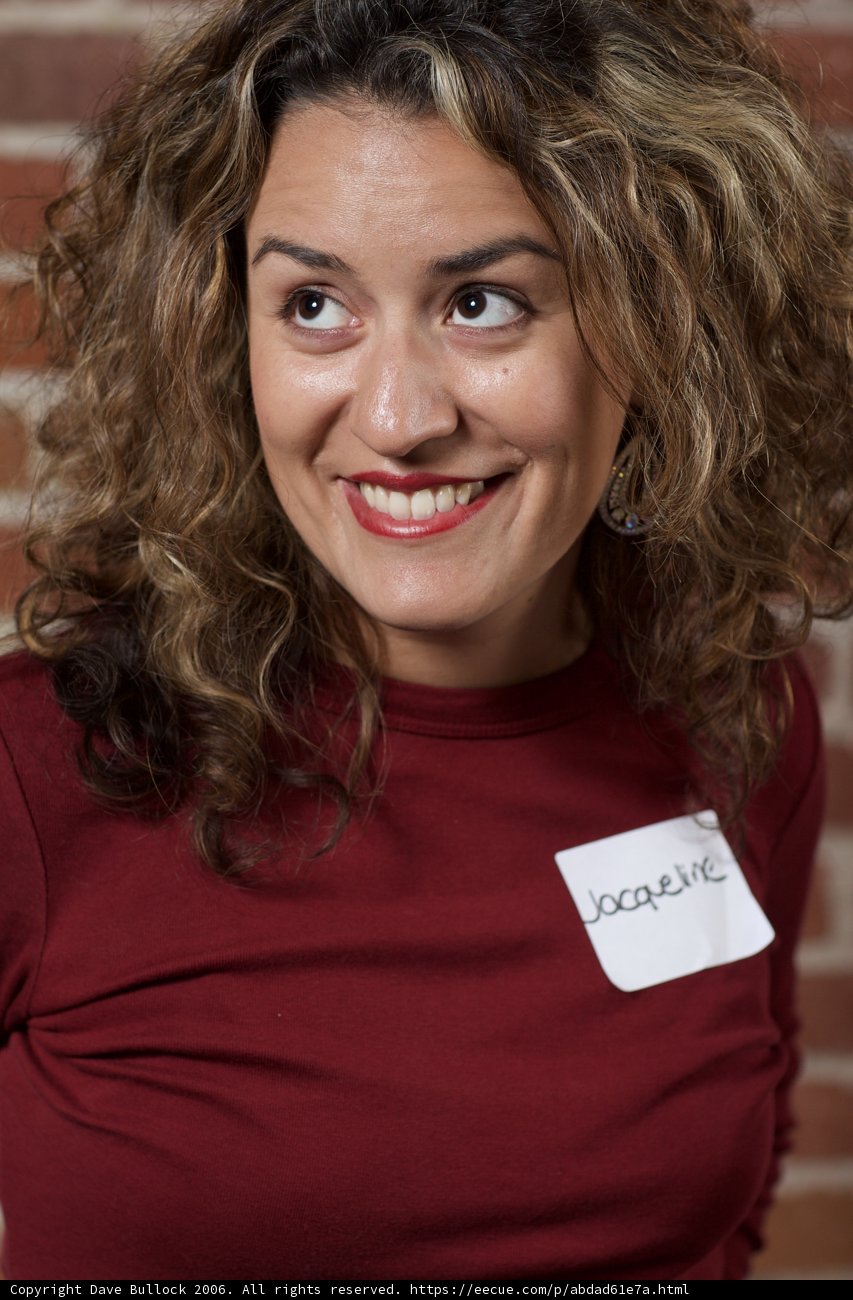 Happy Portrait of a Woman with Curly Hair
