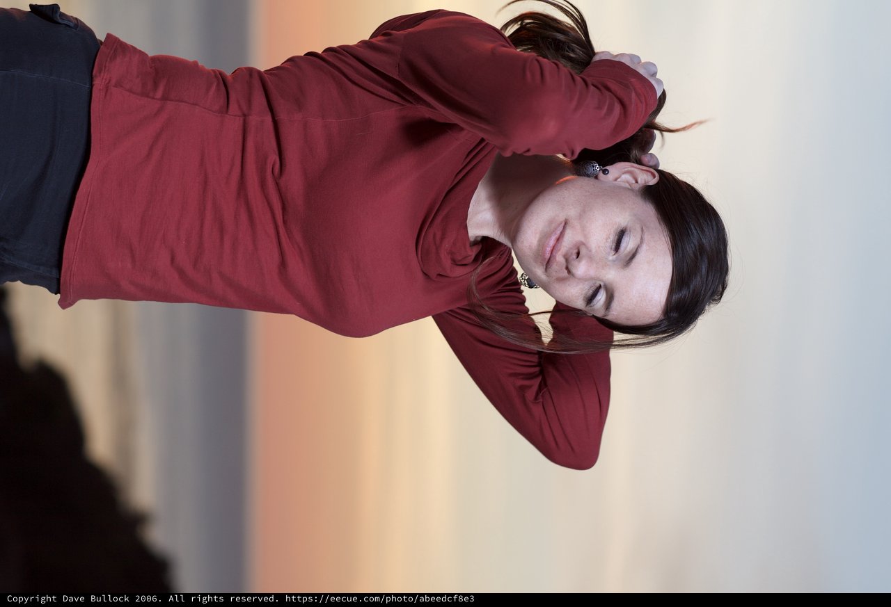 Windswept Woman at Golden Hour by the Sea