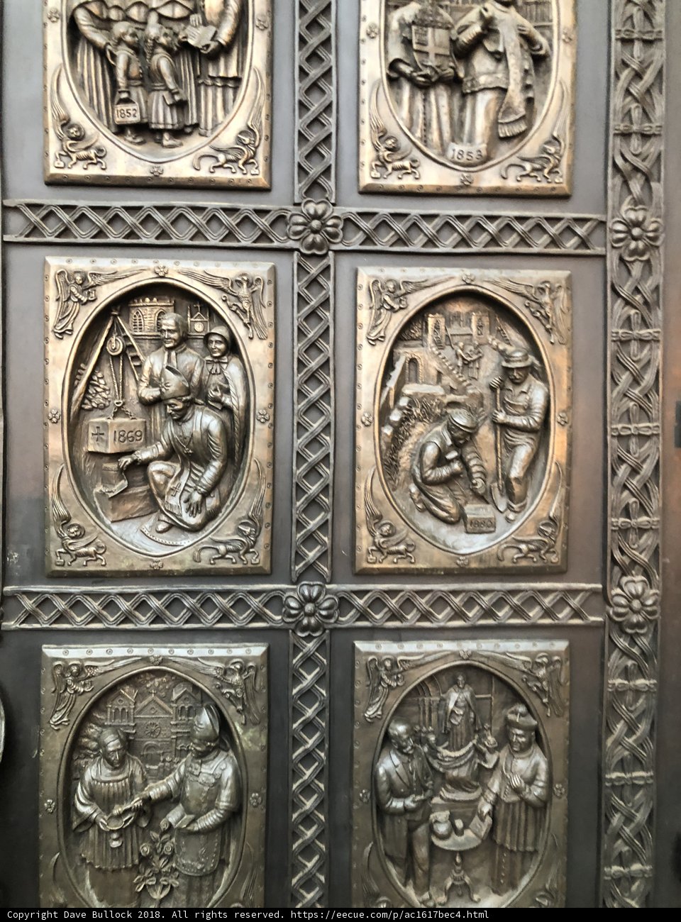 The Bronze Door of Religious Scenes