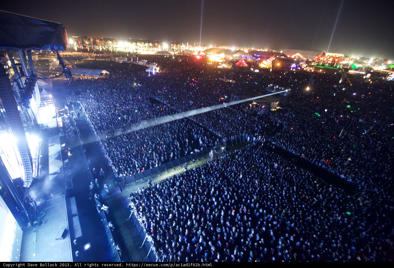 Night Sky Lit by Concert Crowd