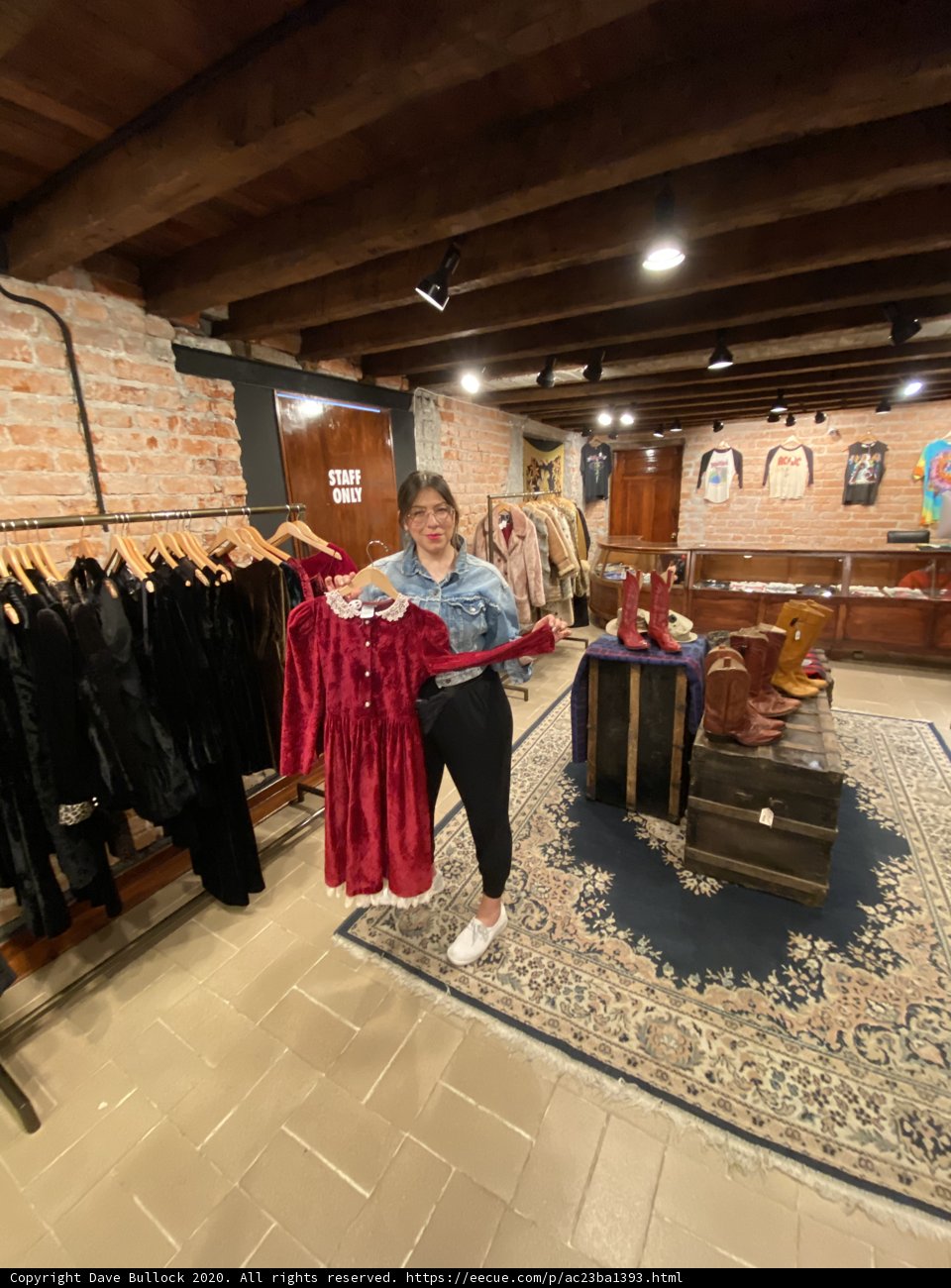 Fashionista in a Shop Caption: Lori S admires the latest footwear and clothing in a Cuauhtémoc shop while browsing through the various accessories and mannequins.