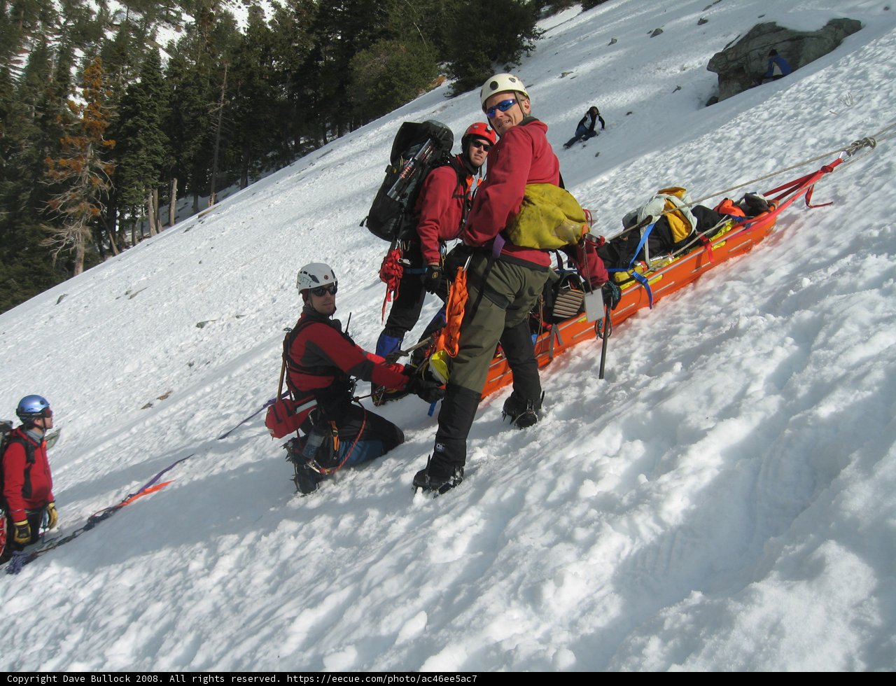 Group Skiing Adventure on Snowy Slope