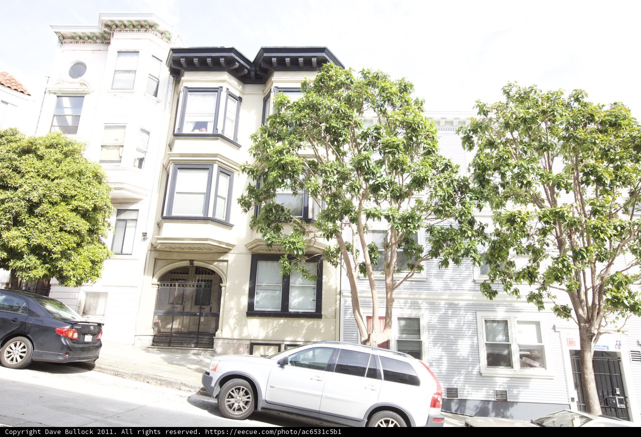 Parked Car in Urban Neighborhood