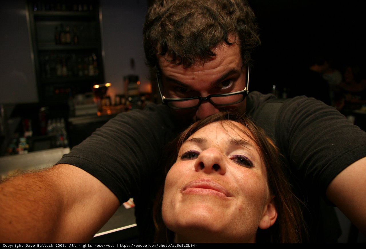 Playful Bar Moment Between Two Friends in 2005