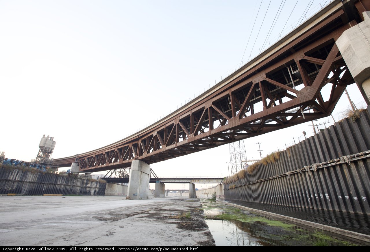 Freeway Overpass with Train and Two People