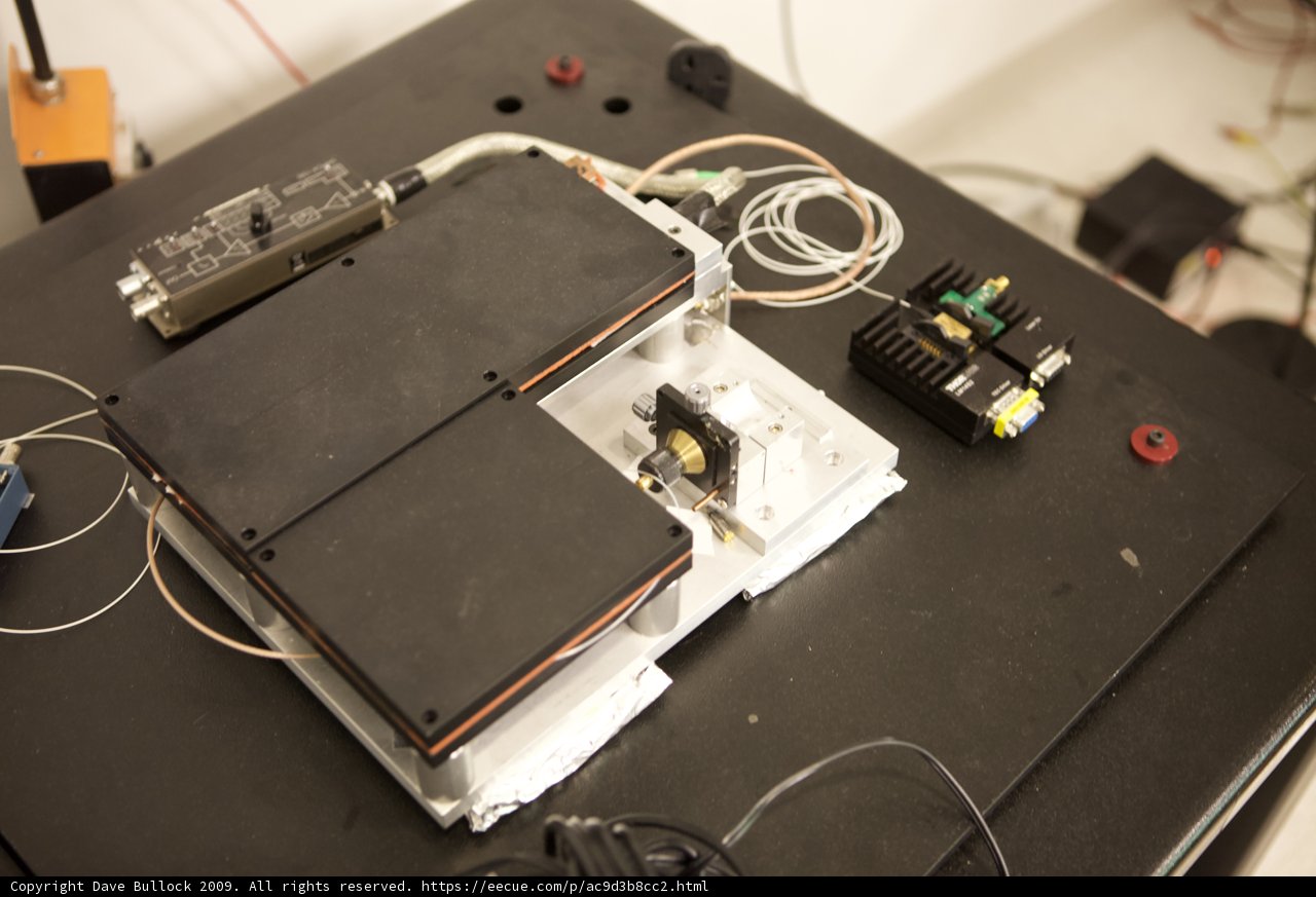 Small Electronic Device with Wires and Other Electronics on a Table